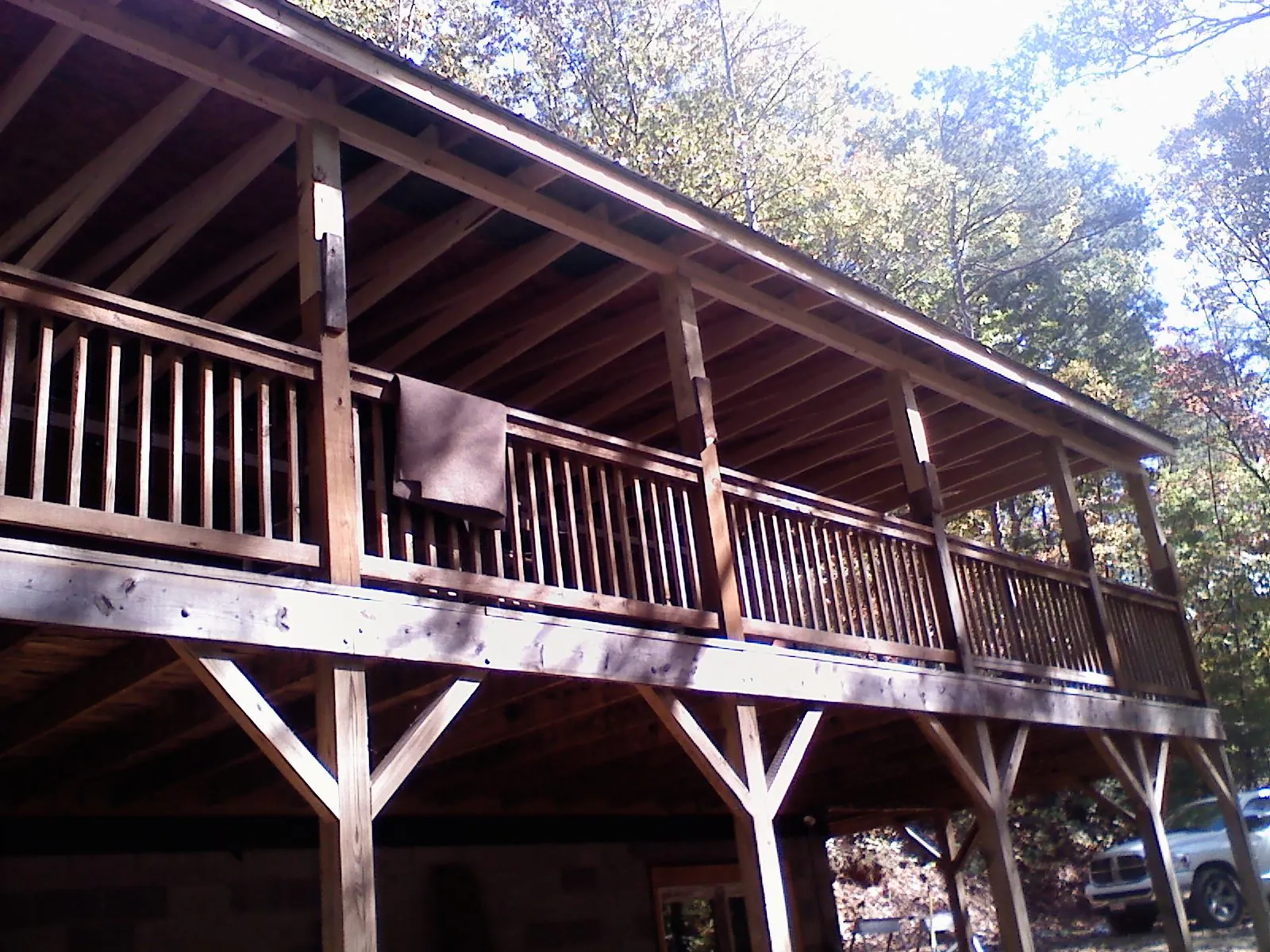 Timber framing under a new elevated porch and deck — Roof Leak Repair in Aroma Park by Roofing Brothers